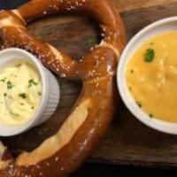 Giant German Soft Pretzels · Served with beer cheese, grain mustard, German mustard.