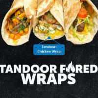 Tandoori Chicken Wrap · Freshly made Tandoor-Fired wrap loaded with tandoori chicken, crispy cabbage carrot blend, t...