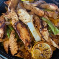 WEEKLY SPECIAL - CHICKEN FAJITAS · Chicken Fajita Meal,
Feed 4, 
Rice and Beans, 
Lettuce, Tomato, Sour Cream, Cheese, Guaca...