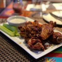 8 Piece Signature Wings · Comes with celery, carrots choice of wing sauce and choice of blue cheese and/or garlic ranc...