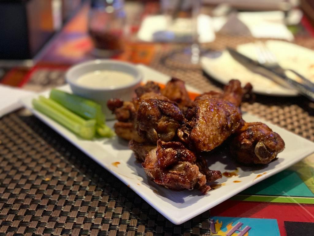 8 Piece Signature Wings · Comes with celery, carrots choice of wing sauce and choice of blue cheese and/or garlic ranch dressing. Note: Cannot order just flats or just drums.