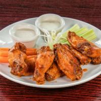 12 Piece Signature Wings · Comes with celery, carrots choice of wing sauce and choice of blue cheese and/or garlic ranc...