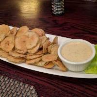 Fried Pickles · Thinly sliced pickles, buttermilk marinated, spiced flour, side car of chipotle-ranch dressi...