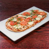 Margherita Flatbread Pizza · Sliced plum tomatoes, mozzarella, fresh mozzarella cheese, fresh basil, rustic tomato sauce.