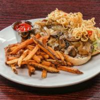 Original Steak n' Cheese Sandwich · Caramelized onions and mushrooms, lettuce, tomato, mayo, crispy onions, Provolone, toasted h...
