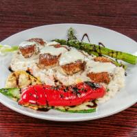 Seared Sea Scallops · cast-iron seared Nantucket sea scallops, toasted almond risotto, grilled vegetables, pineapp...