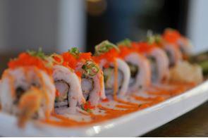 All About Fresh Roll · All About Cha's original sushi roll. Has tempura shrimp and cucumber inside. Topped with shr...