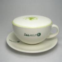 Green Cappuccino · All About Cha's special matcha mix steamed with milk and matcha powder. Topped with milk foam.