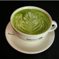 Green Latte · All About Cha’s special matcha mix steamed with milk and matcha powder.