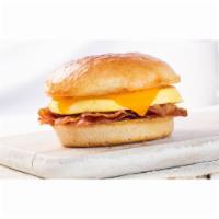 Bacon, Egg and Cheddar Sandwich · Bacon, eggs, cheddar and breakfast sauce.