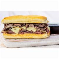 French Dip Sandwich · Roasted beef, Swiss and sauteed onions, served with au jus.