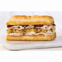 Holiday Turkey Sandwich · Turkey, cornbread stuffing, gravy, cranberry sauce and mayonnaise.