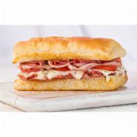 Italian Sandwich · Salami, capicola, ham, mortadella, mozzarella, Roma tomato, Italian seasoning and Italian dr...