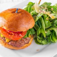 Salmon Creek Cheese Burger · Classic burger in our own brioche bun with tomatoes, lettuce, onion, and secret sauce and ch...