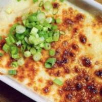 Gnocchi and Cheese · Potatoes gnocchi au gratin in 4 ch iteese sauce such as gruyere, mozzarella, Parmesan, and p...