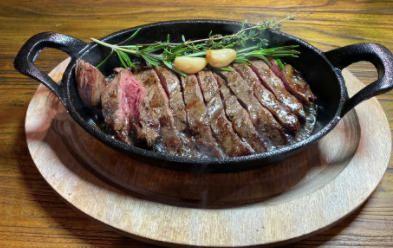 Skirt Cazuela · 12 oz. of grilled skirt steak served in a hot pot - cazuela with roasted garlic, thyme, rosemary, and butter.