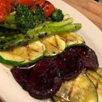 Simple Platter of Grilled Vegetables · With vintage olive oil.