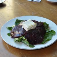 House Roasted Beets Salad · Arugula and Piedmontese robiola goat cheese.