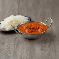 Chicken Makhani · Freshly made tomato sauce with mixed herbs, mild spices, and creamy butter. Served with basm...
