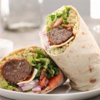 Mediterranean Lamb Meatball Wrap · Mediterranean style baked lamb meatballs(3) and rice pilaf topped with lettuce, tomatoes, re...