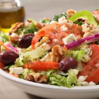 Greek Village Salad · Lettuce, tomatoes, red onions, cucumbers, green bell peppers, carrots, feta cheese, kalamata...