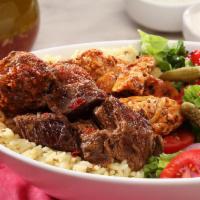 Mixed Bowl · Any three protein over rice pilaf topped with lettuce, tomatoes, red onions, roasted red pep...