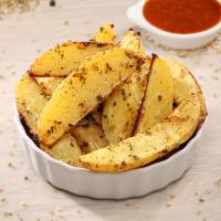 Roasted Potatoes · Mediterranean style seasoned roasted potatoes w/Garlic sauce
