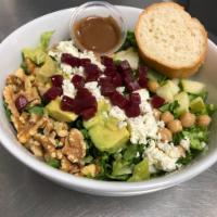 Clooney Salad · Green leaf lettuce, apple, avocado, feta, chickpeas, walnuts and beets tossed in our honey l...