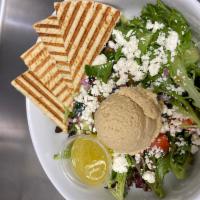 Greek Salad · Mixed greens, kalmata olives, tomato, cucumber, feta, red onion, tossed in our lemon olive o...