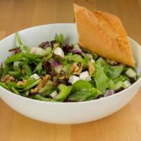 Genevieves Salad · Mixed greens, celery, red onion, apple, feta, walnuts and cranberries tossed in our honey le...