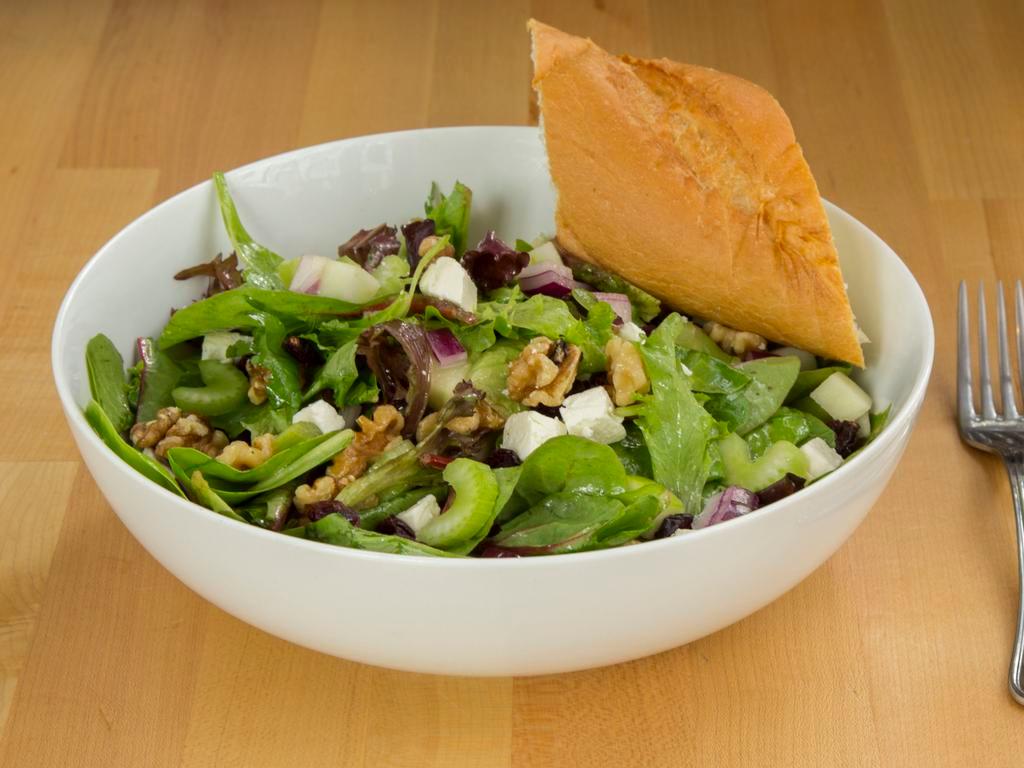 Genevieves Salad · Mixed greens, celery, red onion, apple, feta, walnuts and cranberries tossed in our honey lemon balsamic vinaigrette.