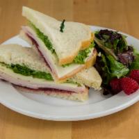 Gobbler Sandwich · Turkey, cranberry sauce, lettuce, provolone and mayo on sourdough. Baked bread.