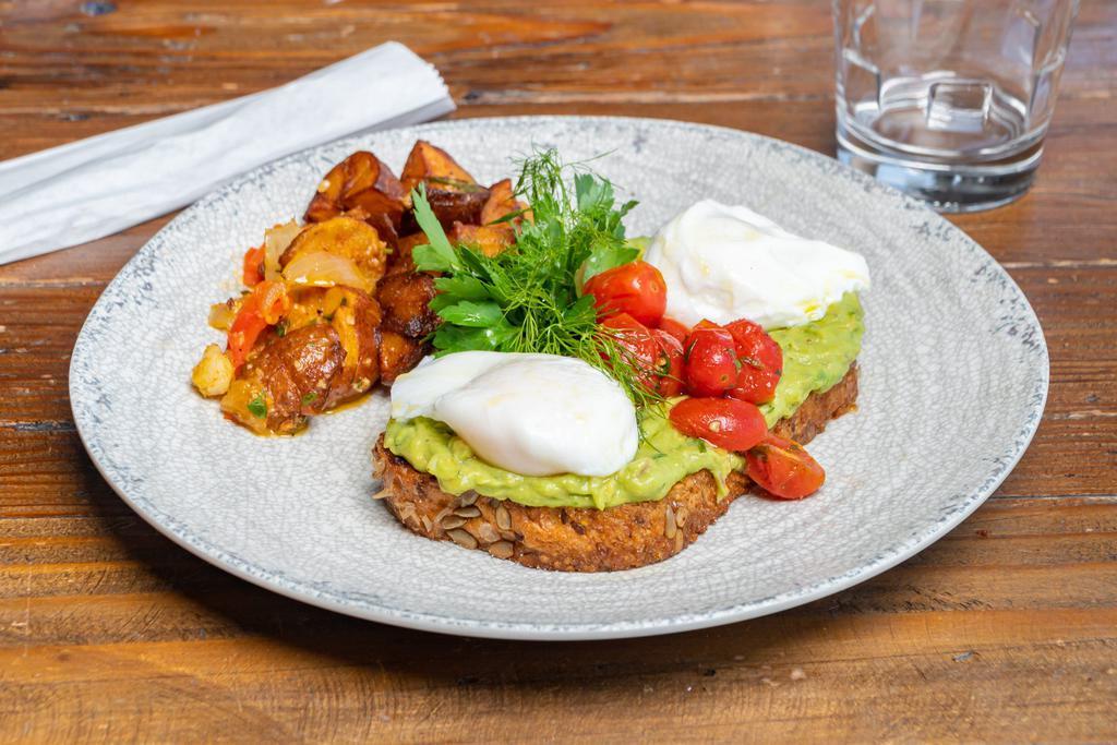 Smashed Avocado Toast · Poached eggs, toasted 7-grain bread, grape tomatoes, parsley, extra virgin olive oil. Vegetarian