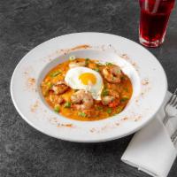 Cajun Shrimp & Grits · Grilled shrimp, andouille sausage, bacon, green peppers, garlic and onions, all seasoned in ...