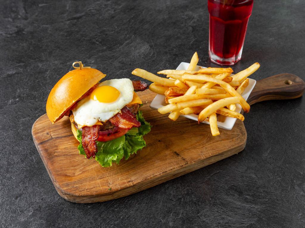 Eggspectation Burger · This eggspectation favorite, a certified angus beef burger, is grilled to perfection and dressed up with chipotle aioli, lettuce, tomato and red onions with strips of crispy bacon over melted cheddar cheese and a sunny-side-up egg on top.