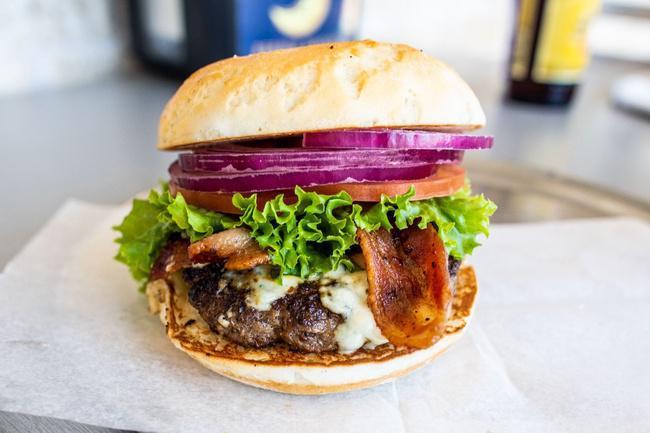 Blue Moon · Smoked Bacon, Blue Cheese Crumbles, Garlic Aioli, Fresh Lettuce, Vine Ripened Tomatoes & Red Onions
*****Now Served with Garlic Aioli*****