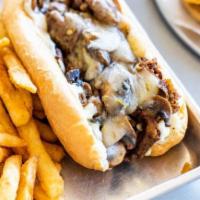 Philly CheeseSteak · Shaved Sirloin Steak, Pepper Jack Cheese, Grilled Onions, Grilled Mushrooms & Garlic Aioli.
...