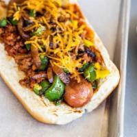Moon Dog · 1/4 Beef Hotdog topped with Chili, Grilled jalapenos and onions, cheese and mustard.