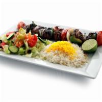 Beef Shish Kabob · 12 oz. of tender Filet mignon, marinated into chunks and charbroiled with bell peppers, toma...