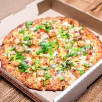 Chili Paneer Tandoori Fusion Pizza · Spicy curry sauce, mozzarella cheese, bell peppers, red onions, diced tomatoes, marinated pa...