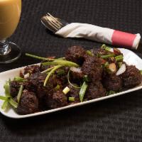 Vegetable Manchurian. · Coated in a Manchurian saugce made from scratch (ginger and garlic, soy sauce, chili sauces ...