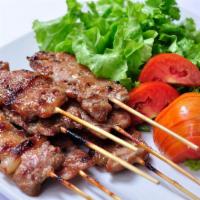 Grilled B.B.Q. Pork · Marinated pork grilled on skewers served with chili and garlic sauce.