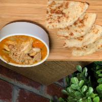 House Special Roti · Pan-roti with chicken, potatoes, onion and peanuts served with massaman curry sauce.