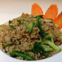 Green Curry Thunder Fried Rice · Served with green curry paste, onion, basil, string bean and egg. Spicy.