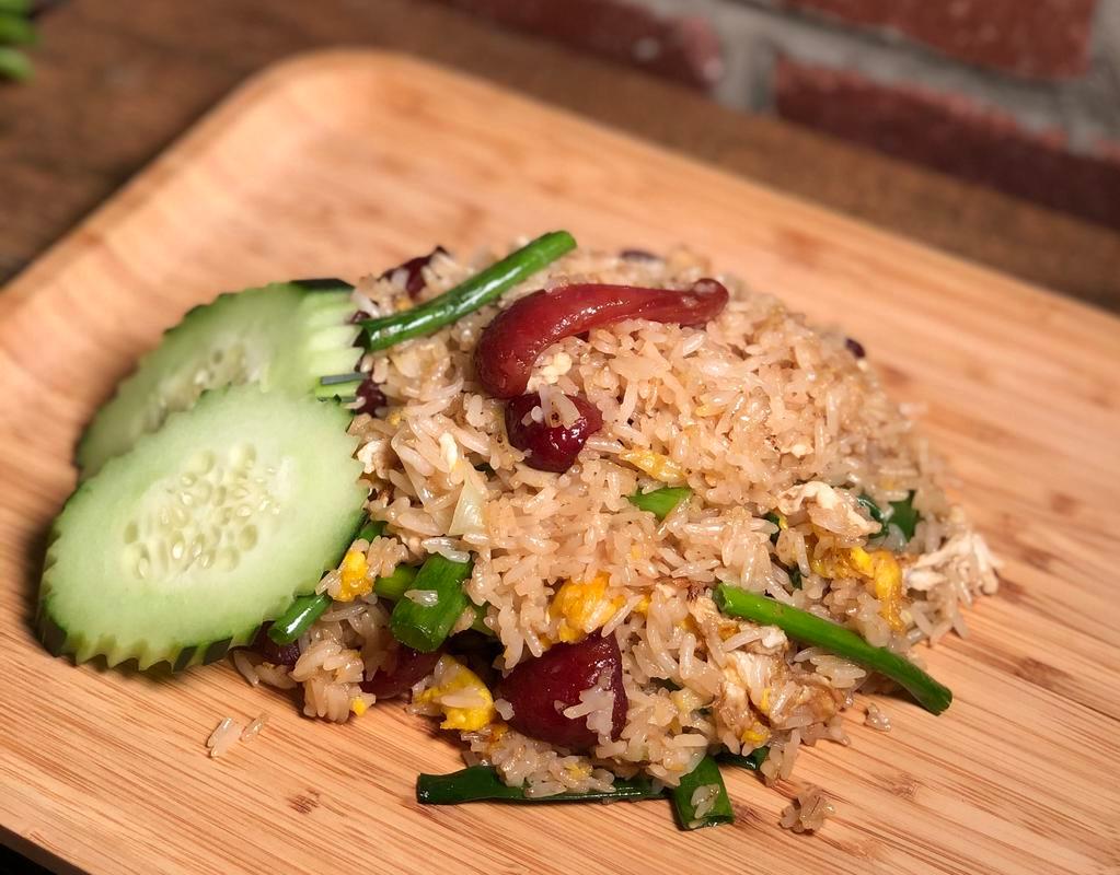 Thai Sausage Fried Rice · Fried Rice with Thai sausage, white onion, scallions and egg