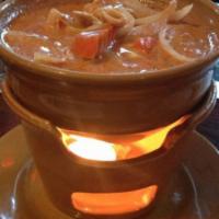 Massaman Curry · Sweet curry paste with potato peanut, onion and carrot in coconut milk. Served with steamed ...