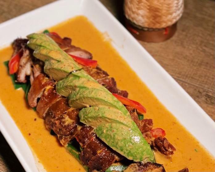 Duck Panang Avocado · A 1/2 roasted duck with avocado, bell pepper, string bean and carrot in panang curry. Served with steamed jasmine rice. Spicy.