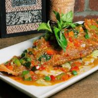 Fried Red Snapper Chili Sauce · garlic and chili sauce. Served with steamed jasmine rice. Spicy.