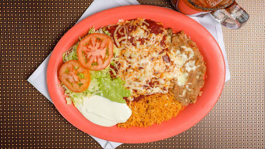 3 Enchilada Plate · 3 enchiladas with choice of meat, rice, beans, sour cream, guacamole, lettuce and tomatoes.