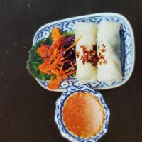 AP3. Soft Spring Roll with Shrimp · Clear soft spring roll with noodles, lettuce, carrots, and shrimp. Can also substitute with ...